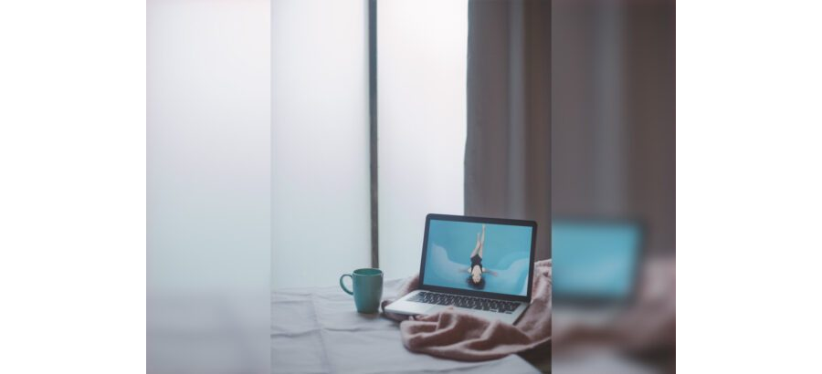 MacBook on Bed Mockup Generator